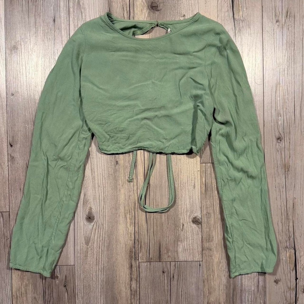 Green long sleeve crop top with tie back detail